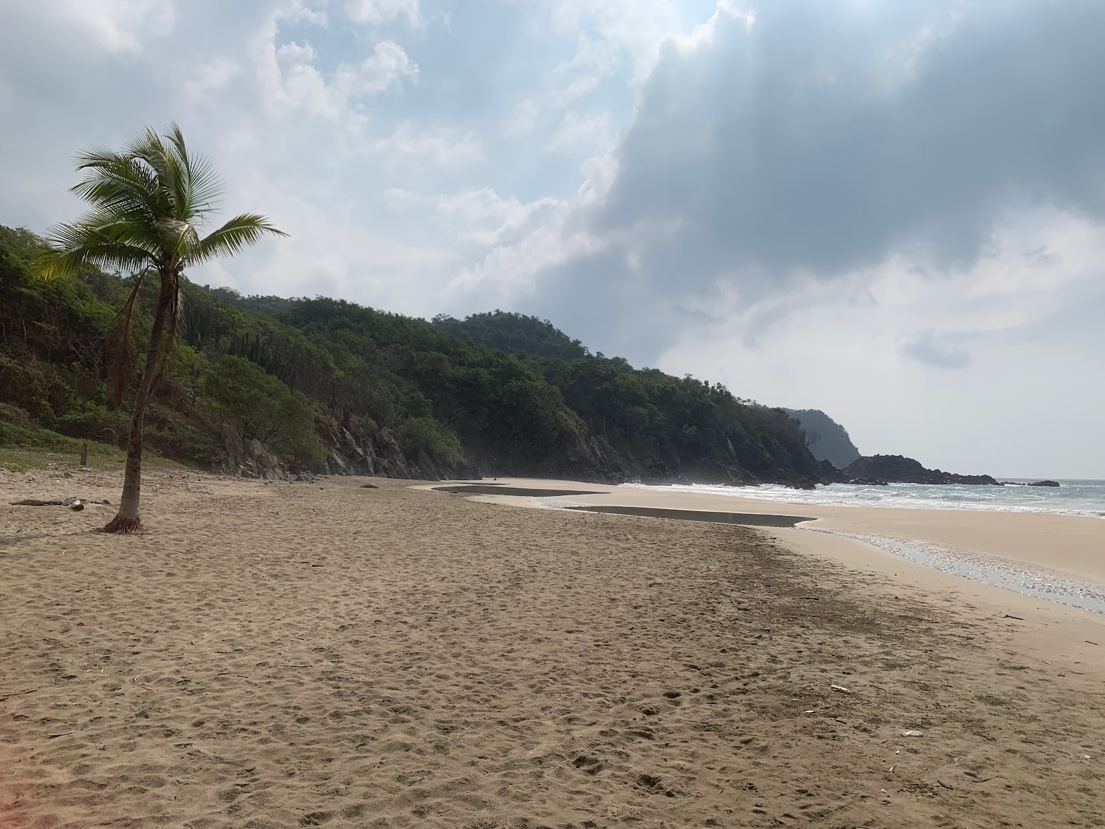 Playa Majahua Zihuatanejo的照片 带有宽敞的海湾