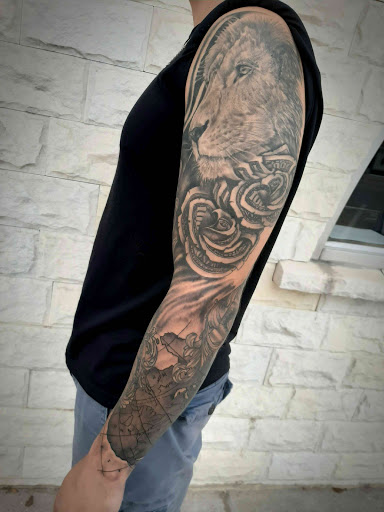 Explore dirtbike tattoo idea, creative tattoo ideas in Lakeview, available at Backwoods Tattoo Studio