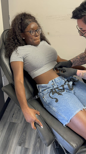 Explore female big tattoo ideas, creative tattoo ideas in Chesapeake, available at Im Just Saiyan Body Piercing