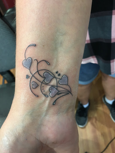 Explore tattoo ideas hearts name, creative tattoo ideas in Fort Lauderdale, available at Rock And Roll Tattoo, Piercing, Laser removal