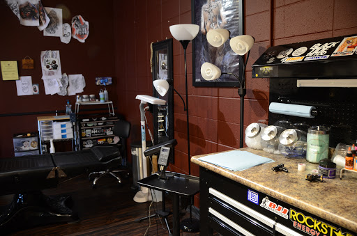 Explore love hurts tattoo ideas, creative tattoo ideas in Huntsville, available at Blacktide Tattoo Co.