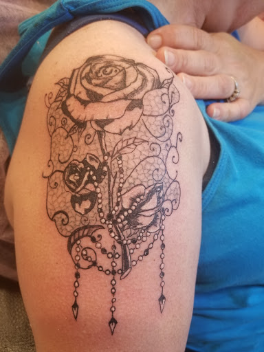 Explore birth year tattoo ideas for guys, creative tattoo ideas in Davis, available at SIX GUN SOUND TATTOO