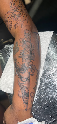 Explore cool neck tattoo ideas, creative tattoo ideas in Roanoke, available at Black Caesar Tattoos & Piercings
