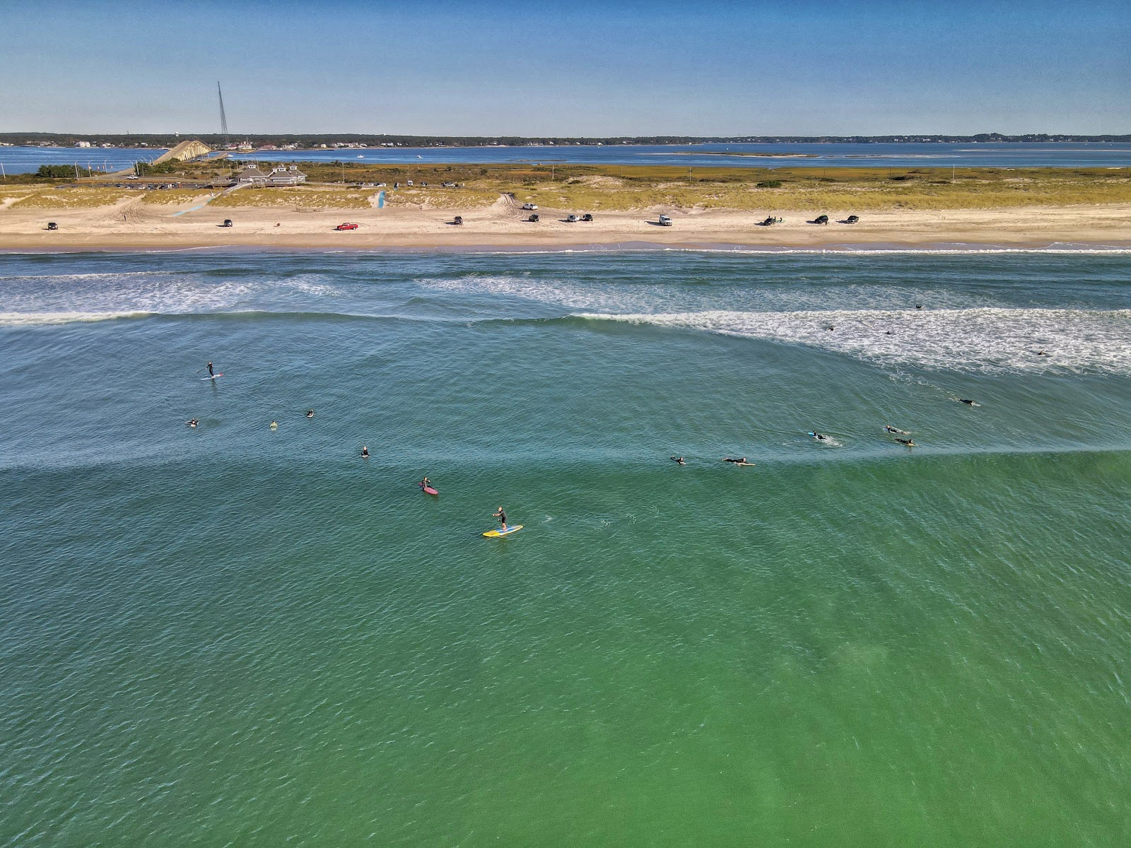 Foto von Ponquogue Beach mit beiger sand Oberfläche