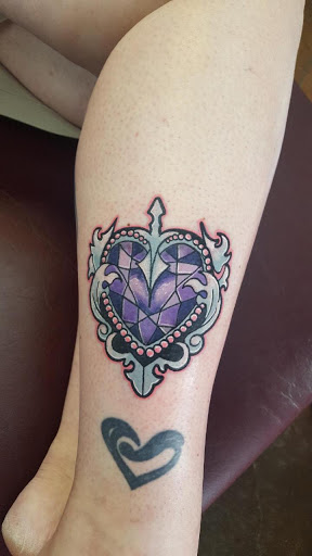 Explore tattoo ideas tribal arm, creative tattoo ideas in Arlington, available at Urbans Tattoo & Piercing Studio