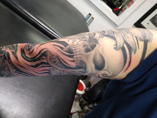 Explore knee ditch tattoo ideas, creative tattoo ideas in Asheville, available at Aacross The Skin Tattoo Shop