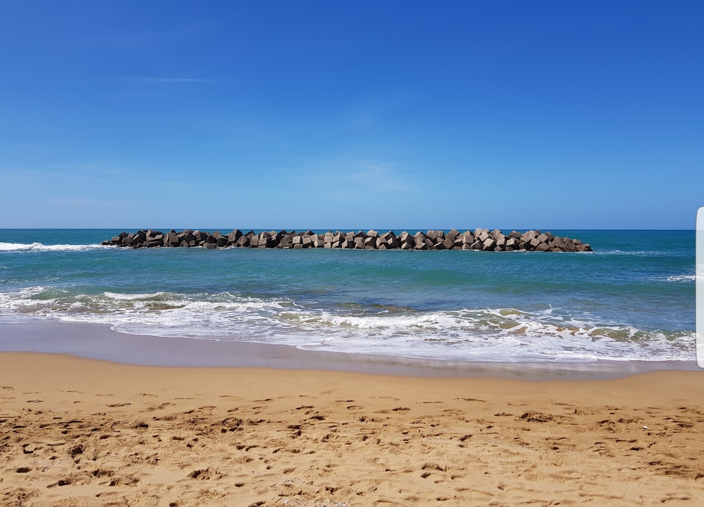 Spiaggia dello Scario'in fotoğrafı küçük koy ile birlikte