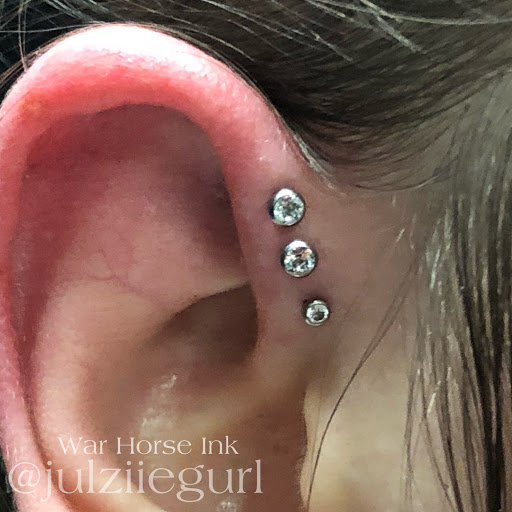 Explore skull tattoo cover up ideas, creative tattoo ideas in Kent, available at War Horse Ink