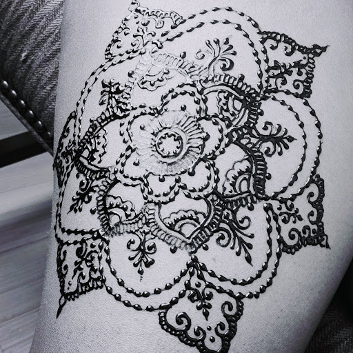 Explore half sleeve tattoo ideas black and grey, creative tattoo ideas in Concord, available at Naseera Fazil Henna Art
