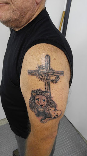 Explore shoulder tattoo ideas for guys, creative tattoo ideas in Panama City Beach, available at Revolution Tattoo & Body Piercing