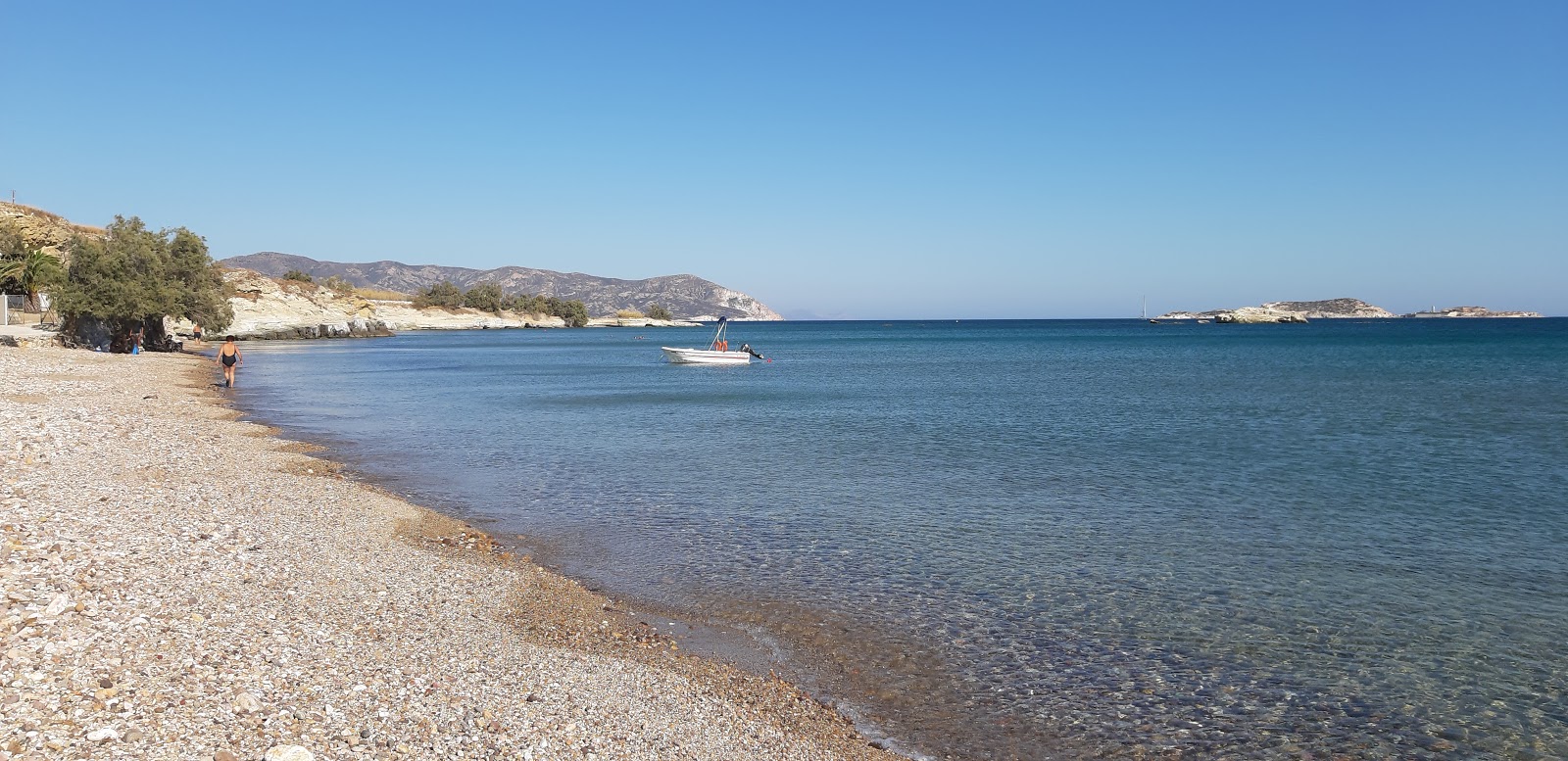 Foto di Aliki beach con una superficie del sabbia beige e ciottoli