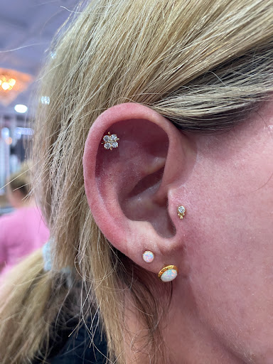 Explore tattoo ideas with husband's name, creative tattoo ideas in Orange, available at Symbiosis Body Piercing