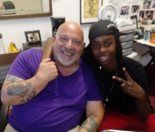 Explore malcolm x tattoo ideas, creative tattoo ideas in New Orleans, available at Catahoula Tattoo 