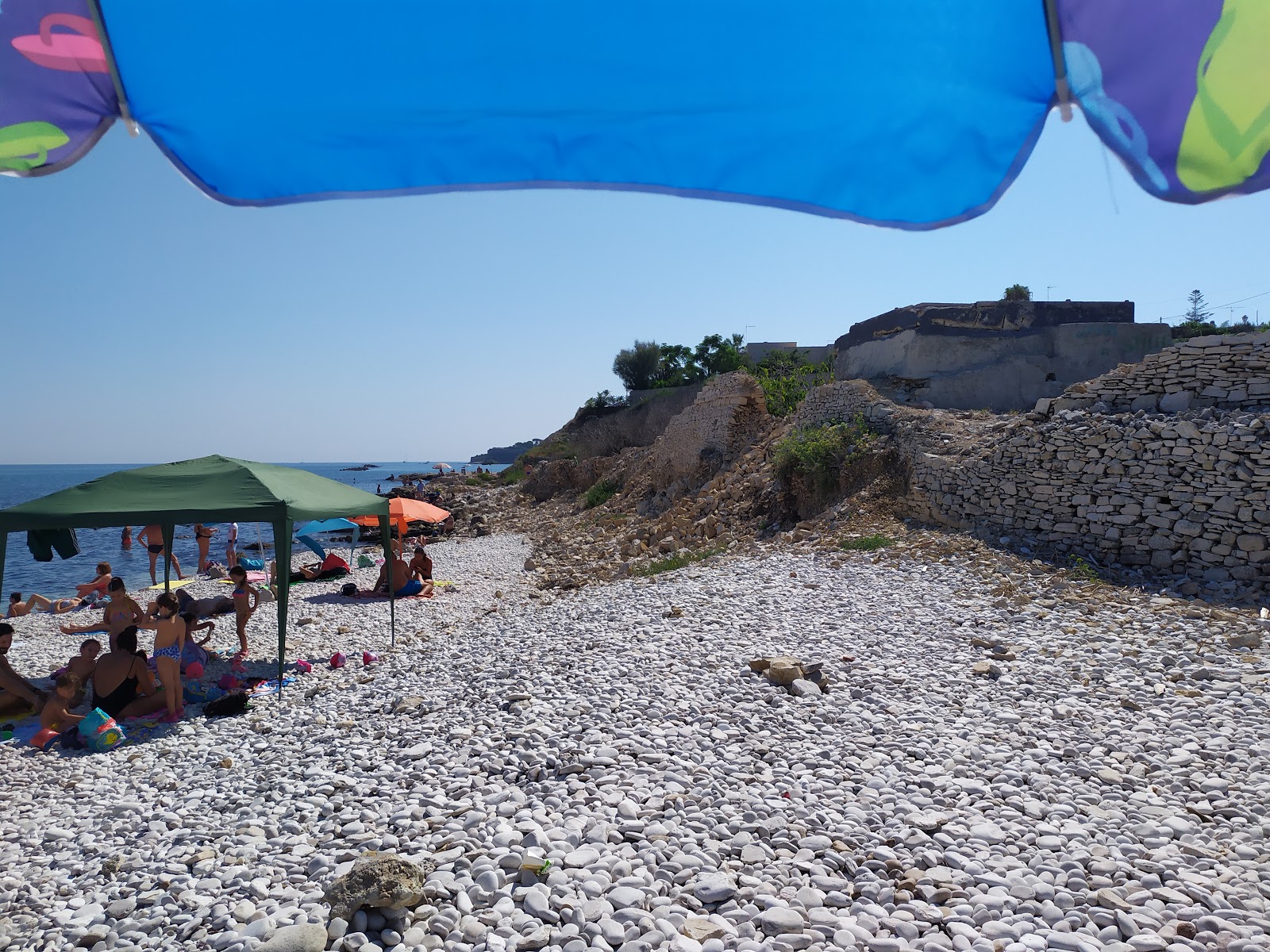 Spiaggia La Torretta的照片 带有宽敞的海岸