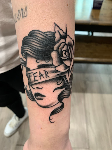 Find good first tattoo ideas for guys for your next unique tattoo in Elkview at Andy Electric Tattoos