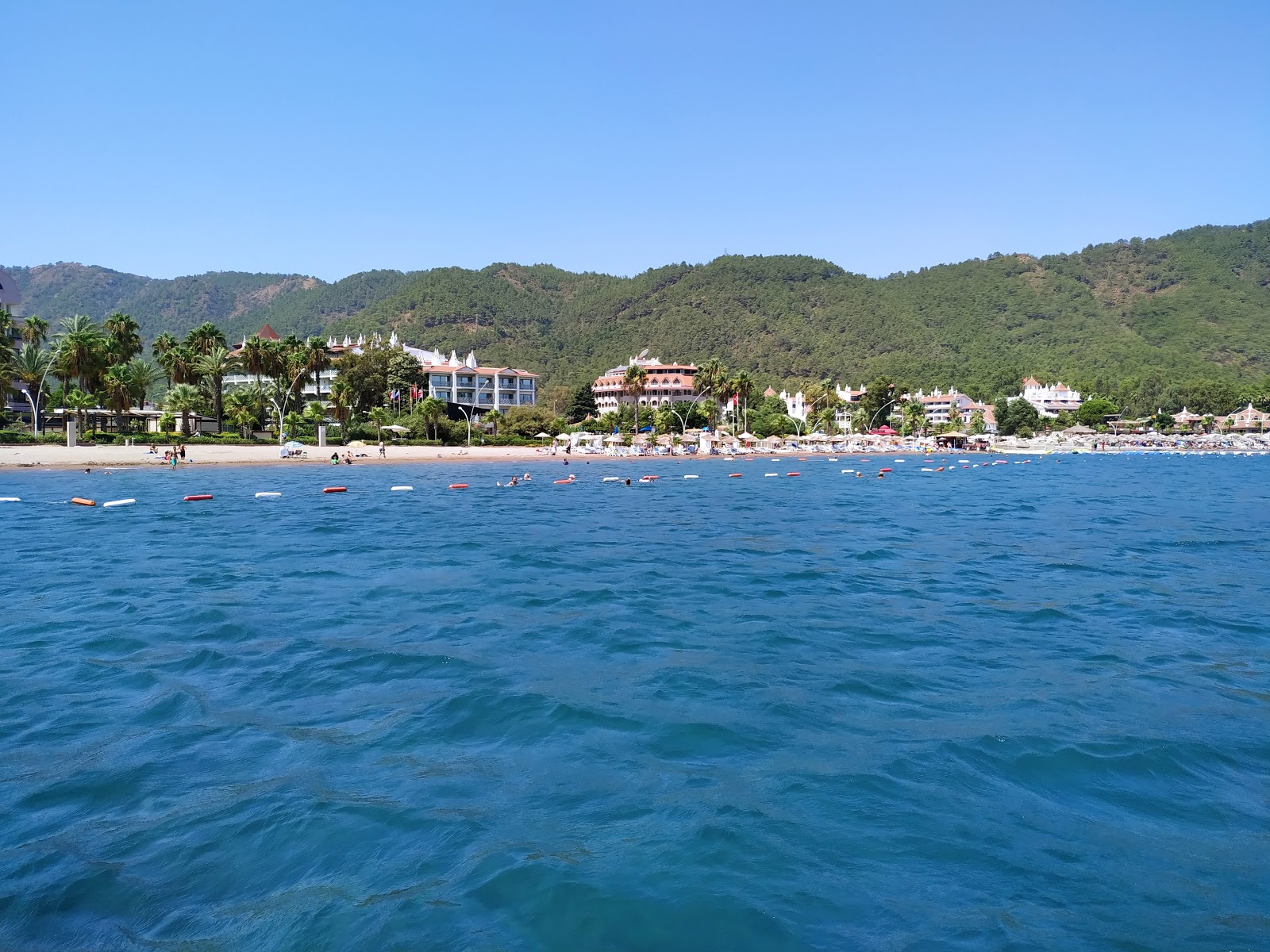 Foto de Playa de Icmeler con bahía mediana