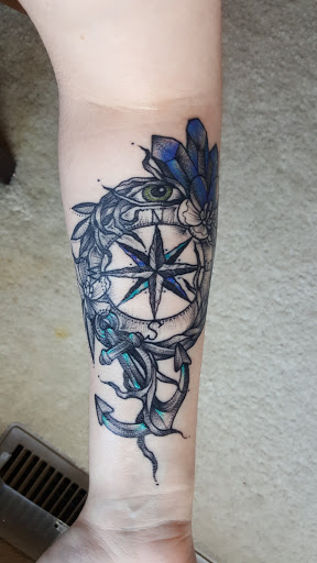 Explore arsenal tattoo ideas, creative tattoo ideas in Akron, available at Assassin Tattoo Studio