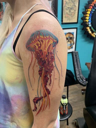 Explore carnage tattoo ideas, creative tattoo ideas in Wichita, available at Addictions In Ink