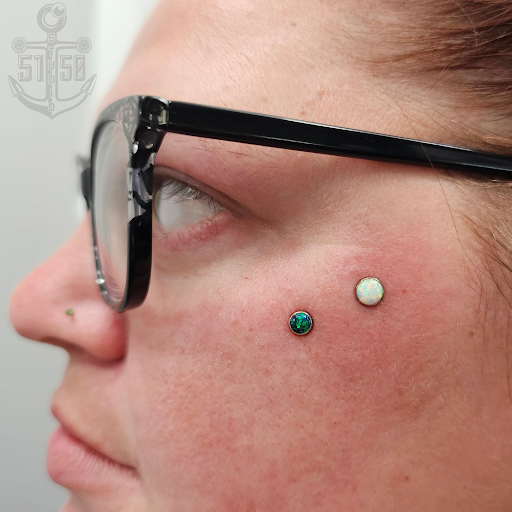 Explore liberty bell tattoo ideas, creative tattoo ideas in Kearney, available at Studio 5150 Piercing & Fine Jewelry