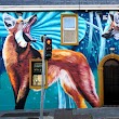 Mural "Maned Wolves" by Nina Valkhoff for Waterford Walls
