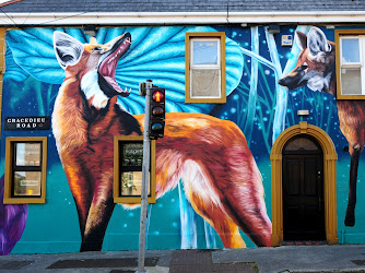 Mural "Maned Wolves" by Nina Valkhoff for Waterford Walls