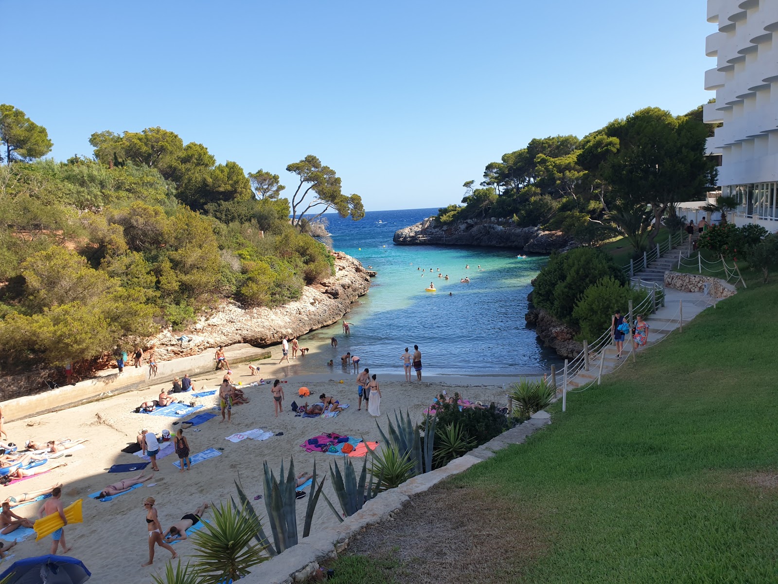 Photo of Cala De Egos with bright fine sand surface