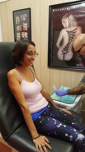 Tattoo Shop «The Ultimate Tattoo & Body Piercing», reviews and photos, 2933 W Henrietta Rd, Rochester, NY 14623, USA