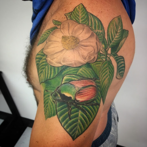 Explore honeysuckle tattoo ideas, creative tattoo ideas in Danbury, available at Mad Hatter Tattoo