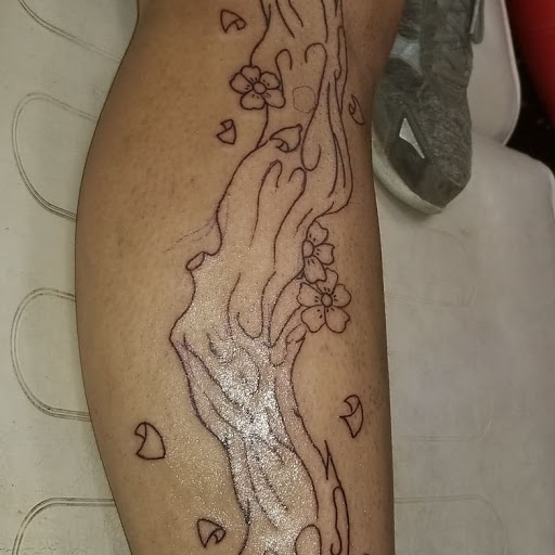 Explore small face tattoo ideas, creative tattoo ideas in Onalaska, available at Divine Designs tattoo studio