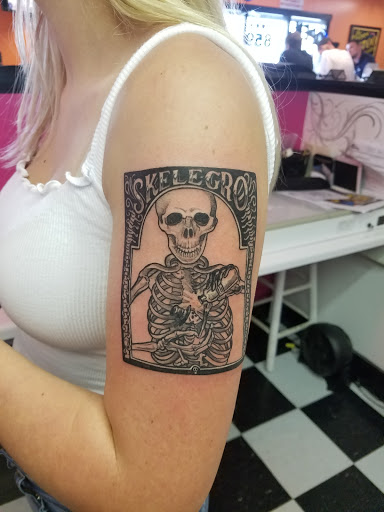 Explore chest tattoo lettering ideas, creative tattoo ideas in Nicholasville, available at Castle of Color