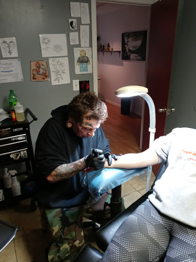 Tattoo Shop «Sacred Ink Tattoo», reviews and photos, 2707 E Court St, Flint, MI 48503, USA