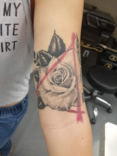 Explore tribal dragon tattoo ideas, creative tattoo ideas in Modesto, available at Ink Disciples Tattoo Parlor