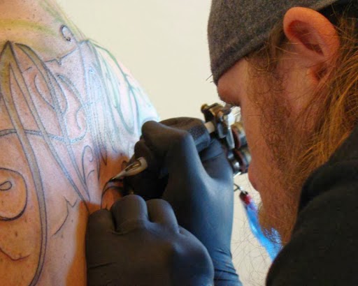Explore alpha male tattoo ideas, creative tattoo ideas in Phoenix, available at Revival Art Collective