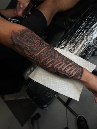 Explore guy thigh tattoo ideas, creative tattoo ideas in Mcallen, available at House of Tattoos