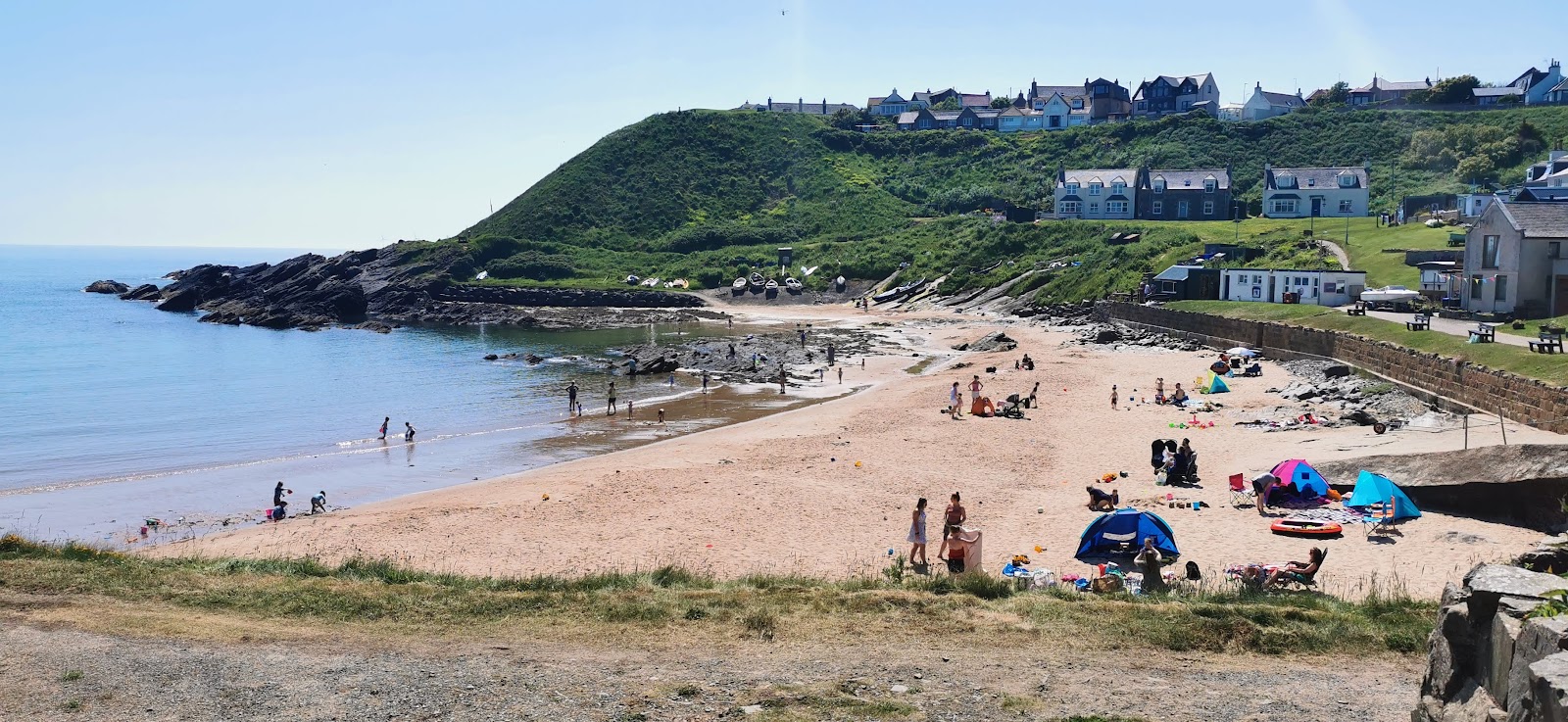 Photo of Collieston Beach with bright sand surface