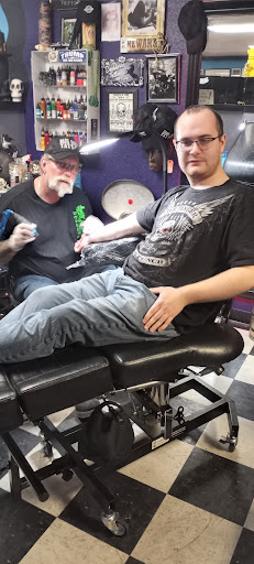 Explore we the people tattoo ideas, creative tattoo ideas in Prudenville, available at Dark Horse Tattoo Studio