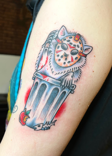 Explore weightlifting tattoos ideas, creative tattoo ideas in Washington, available at Fattys Tattoos & Piercings H Street