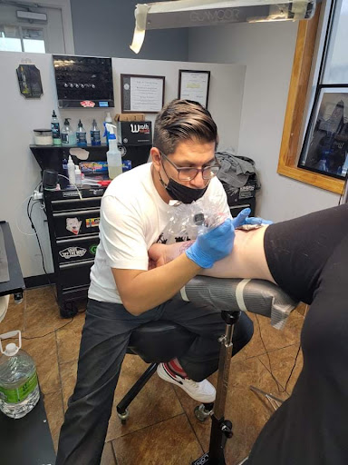 Explore hunting fishing tattoo ideas, creative tattoo ideas in Fort Wayne, available at Grade A Tattoos and Body Piercing