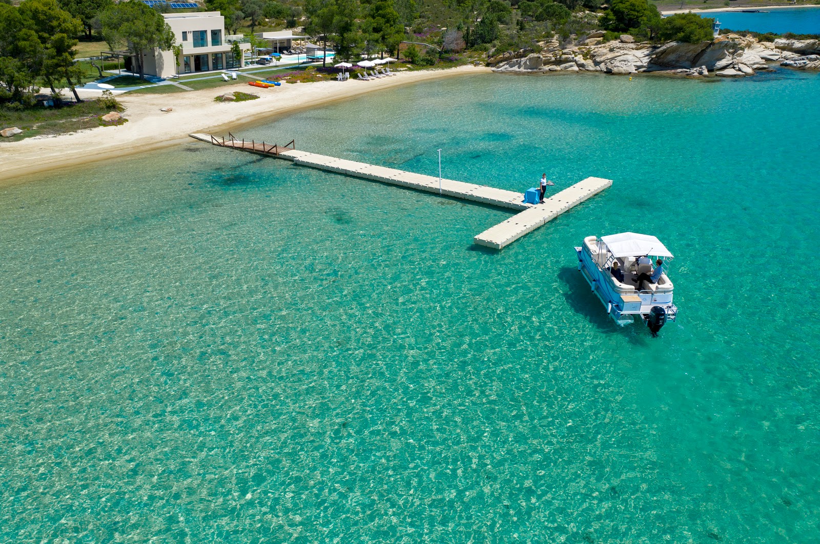 Fotografija Tiamo beach z turkizna čista voda površino