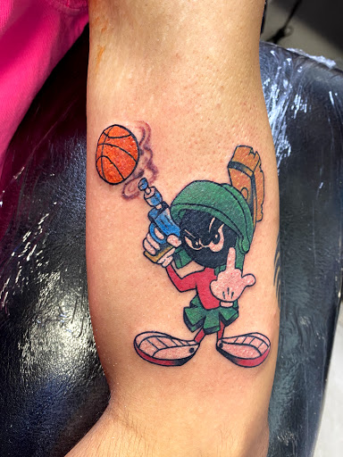 Explore father time tattoo ideas, creative tattoo ideas in Passaic, available at District 36 Tattoo Parlor