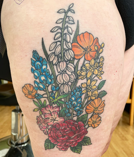 Explore black flower tattoo ideas, creative tattoo ideas in Santa Fe, available at Altura Tattoo