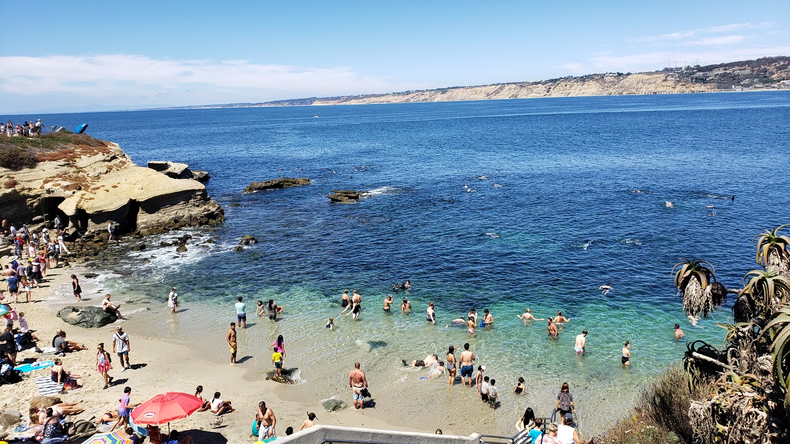 Photo of La Jolla Cove with bright sand surface
