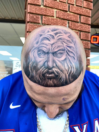 Explore rib tattoo ideas, creative tattoo ideas in Dallas, available at Empire barbers & Ink