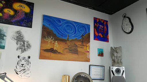 Tattoo Shop «Liquid Tattoo», reviews and photos, 16583 Old U.S. 27, Lansing, MI 48906, USA