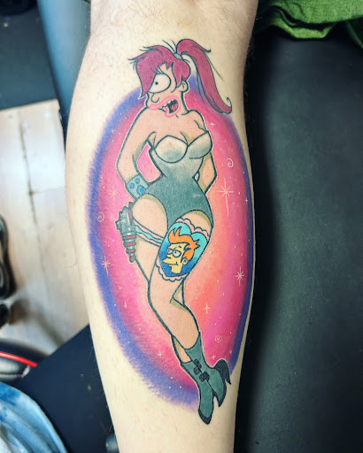Explore colored tattoo ideas for men, creative tattoo ideas in Cedar Falls, available at Tales Untold Tattoos