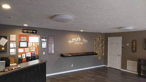 Explore skull neck tattoo ideas, creative tattoo ideas in Gadsden, available at Sacred Art Tattoo Company