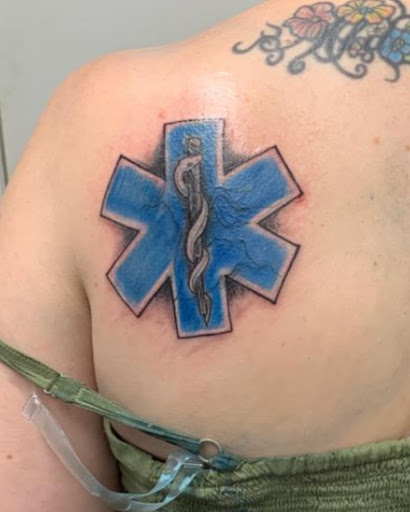 Explore dead dog tattoo ideas, creative tattoo ideas in Buffalo, available at Iron Horse South