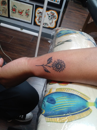 Explore alcohol tattoo ideas, creative tattoo ideas in Jacksonville, available at Idle Hands Tattoo Co.