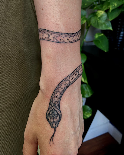 Explore thigh flower tattoo ideas, creative tattoo ideas in Scipio Center, available at Ace of Wands Private Tattoo & Tarot Studio . Appointment Only