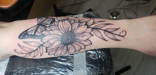 Explore praying tattoo ideas, creative tattoo ideas in Augusta, available at True North Tattoos and Piercings